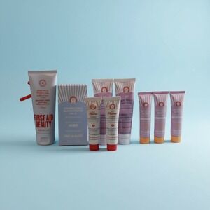 First Aid Beauty Skin Care 9 Piece Bundle Face Body Sunscreen Skincare w/ Bag